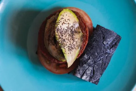 A beyond delicious plant based non meat burger with avocado and chia seeds Stock Photos