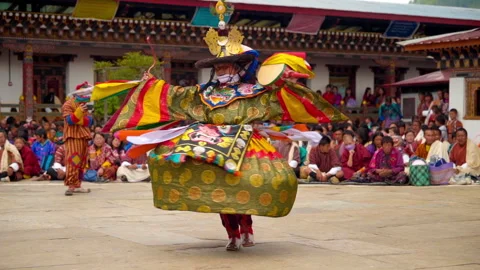 Bhutan Mask dance in slow motion Stock Footage 253571430