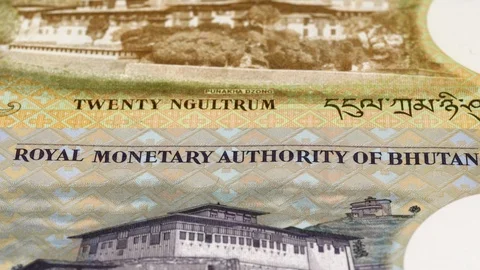 Bhutan ngultrum notes fast tracking. Slider shot, low angle. 4K Stock-Footage 126003293