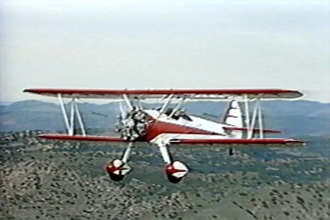 Bi-Plane Flying Stock Footage 567613