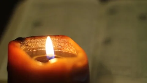 Bible and Candle Stock-Footage 8525895