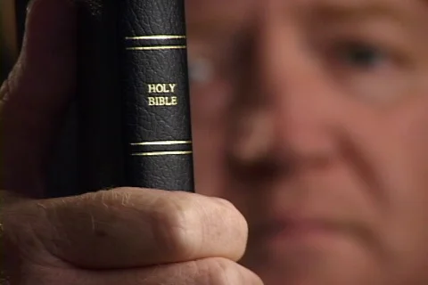 Bible And Face Stock Footage 582939