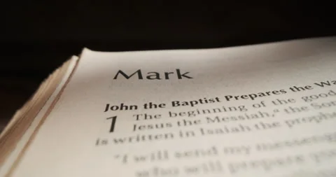 Bible Book Mark title slide over page Stock Footage 257675137