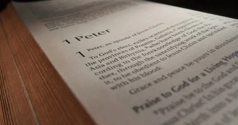 Bible Book Peter title slide over page Stock Footage 257675901