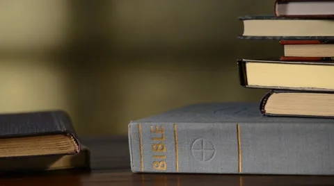Bible with books in the church,rack focus Stock Footage