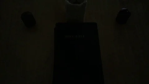 Bible with Candles Being Lit Video stock 82213802