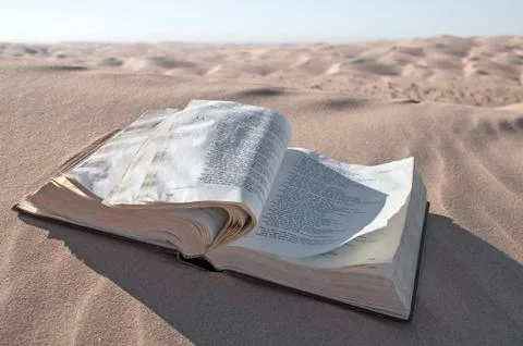 Bible in desert Stock Photos