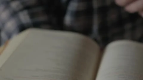 Bible flipping close-up, slow motion. Stock Footage 297844654