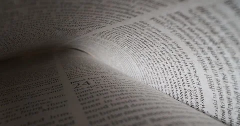 Bible inside view macro slide book of John Jesus has risen Stock Footage 257612674