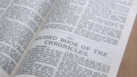 Bible open to 2nd Chronicles. Stock Footage 166638815