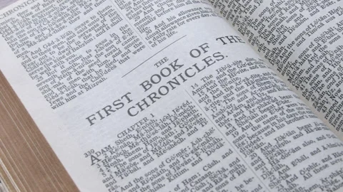 Bible open to the book of 1st Chronicles Stock Footage 166638829