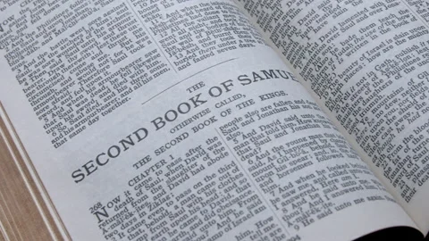 Bible open to the book of 2nd Samuel Stock Footage 166655746