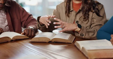 Bible study, group and hands with discussion of scripture for holy knowledge Stock Footage 312827423