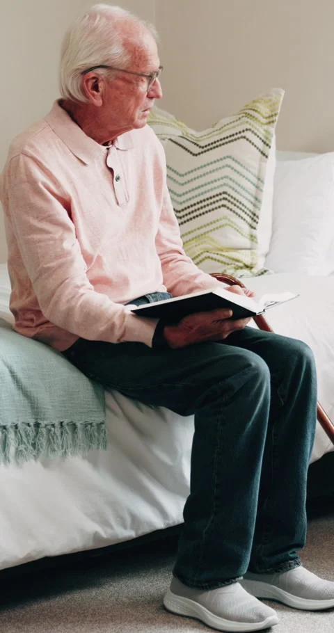 Bible, thinking and senior man in home, religion and worship with holy scripture Stock-Footage 339048666