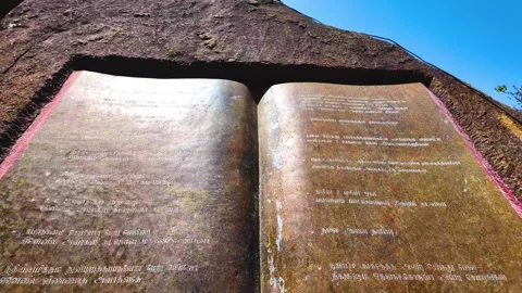 Bible in Vernacular Language - Backwards Shot 스톡 동영상 263320051