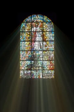 Biblical stained glass with rays of light shining through イラスト素材
