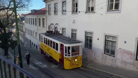 The Bica Funicular in one of Lisbon's most picturesque streets. Stock Footage 240937775