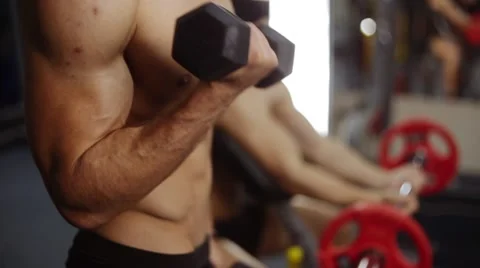 Biceps curls with barbells. Closeup Stock Footage 55007143