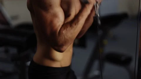 Biceps curls in machine. Slow motion Stock Footage 55007936