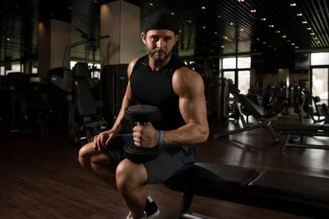 Biceps Exercise With Dumbbells Stock-Fotos