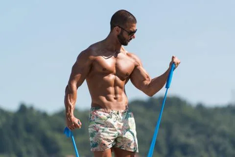 Biceps Exercise Using Resistance Bands Stock-Fotos