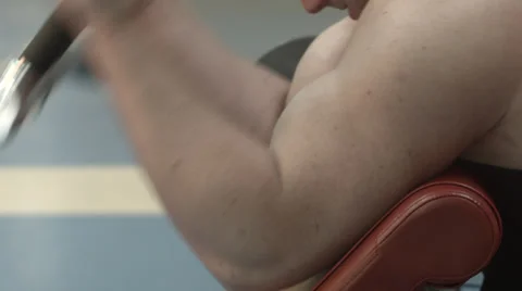 Biceps muscle training exercise at gym Stock Footage 37434255