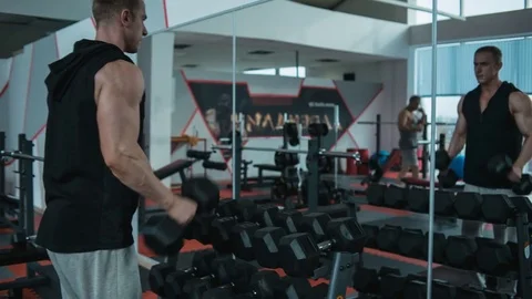 Biceps workout with dumbbells. Few frames Video stock 82350542