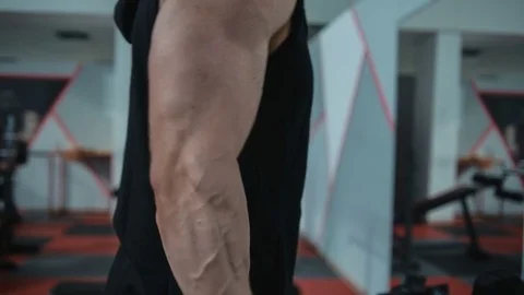 Biceps workout with dumbbells Stock Footage 82350320