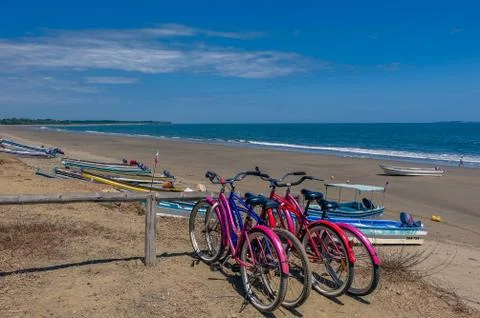 Bicicles in the beach Stock Photos