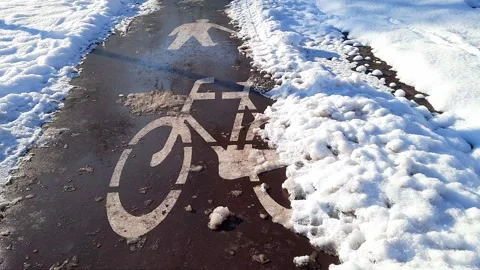 Bicycle and pedestrian path covered with snow. Stock Footage 259662636