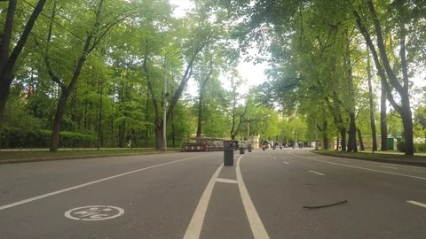 Bicycle and roller Path In Summer Park Timelapse Stockbeeldmateriaal 78019361