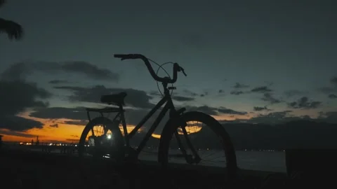 Bicycle and sunset at beach Stock-Footage 150506433