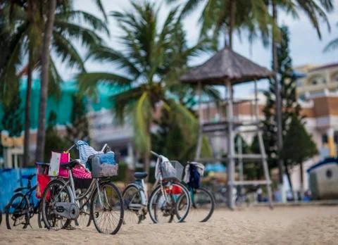 Bicycle on the beach on a blue sky Stock Photos