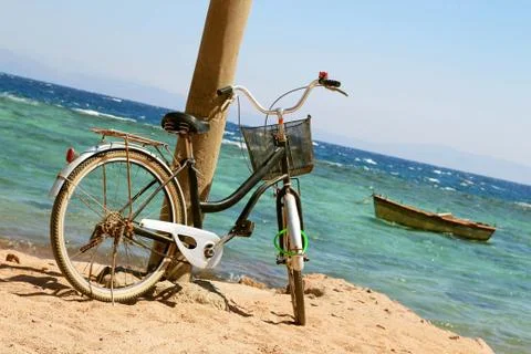 Bicycle on beach Stock Photos