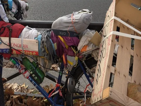A bicycle bizarre improvised with waste in the middle of Paris Stock Footage 83468197