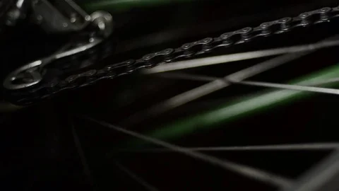Bicycle chain on dark background slow motion Видео 83535119