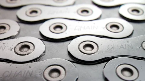 Bicycle chain laid down in endless pattern. Stock Footage 89580621