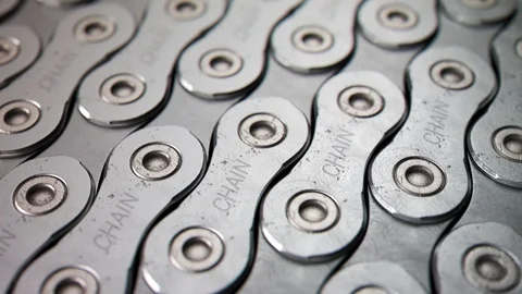 Bicycle chain laid down in endless pattern. Stock Footage 89581876