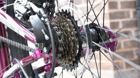 Bicycle chain moving up and down through the gears Stock Footage 129849345