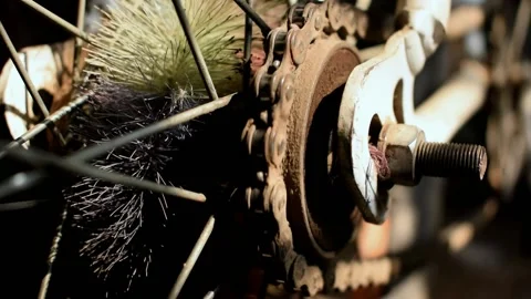 Bicycle chain running in circle while paddling. the back wheel view with clos Stock Footage 130460563