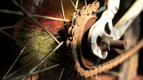Bicycle chain running in circle while paddling. the back wheel view with clos Stock Footage 130836383
