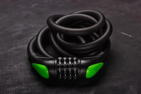 Bicycle combination lock on black background Stock Photos