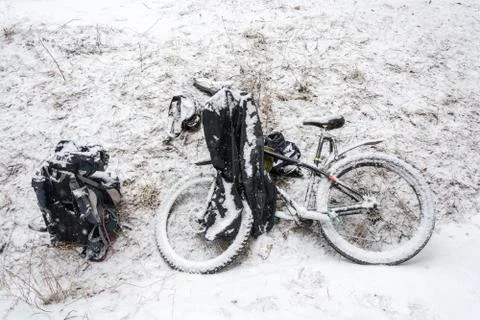 Bicycle covered with snow. Stock Photos