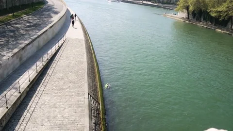 A Bicycle Crashed in the Seine River in Paris France Stock Footage 212178666