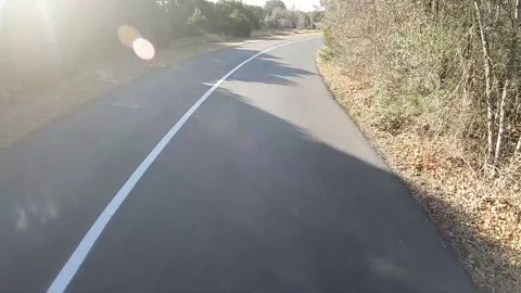 Bicycle cycling down country path Video stock 231073007