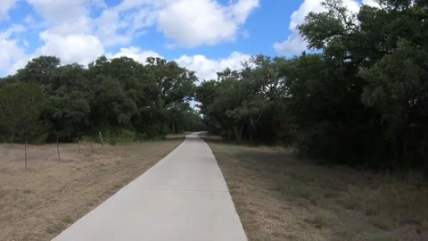 Bicycle cycling down country path Video stock 231073009