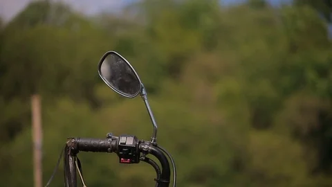 Bicycle Decoration on the motorcycle steering Stock Footage 77576274