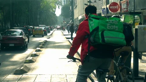 Bicycle Delivery riders Stock Footage 123969686