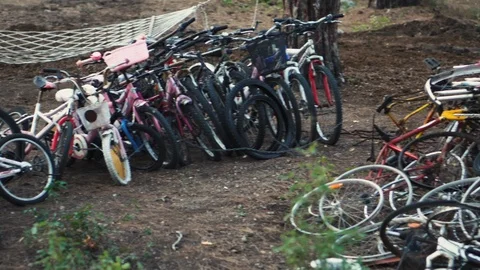 Bicycle dump. Used broken bikes are piled up Stock-Footage 118658027