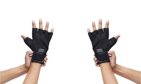 Bicycle gloves on white background. Gym equipment. Fitness. Workout gloves used  Stock Photos
